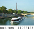 Tourist boat of the Seine river and the Eiffel Tower 11977123