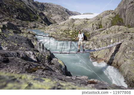 Bridge over waterfall near Svelgabreen glacier (Hordaland county Bridge over waterfall near Svelgabreen glacier (Hordaland county 11977808