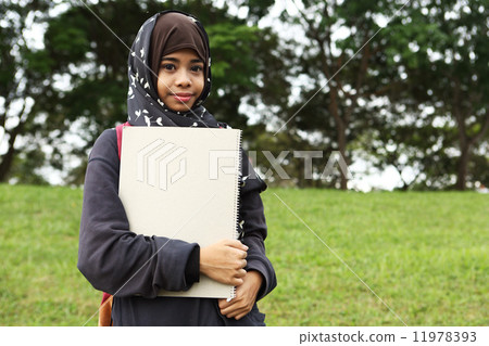 Asian girls returning to school 11978393