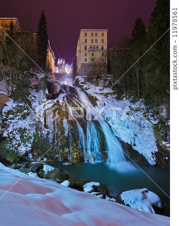 Waterfall in Mountains ski resort Bad Gastein Austria 11978561