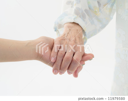 Senior women holding hands Senior women holding hands 11979380