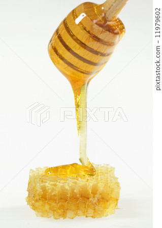 honey with wood stick 11979602