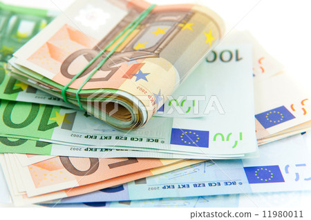 rolled with rubber euro notes on white background rolled with rubber euro notes on white background 11980011