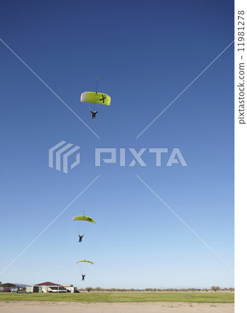 Stock Photo: Compilation of Skydivers approaching for landing