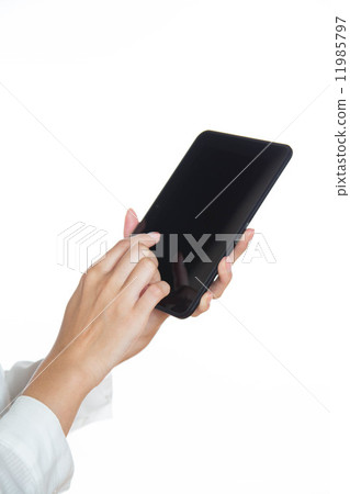 A woman with a tablet A woman with a tablet 11985797