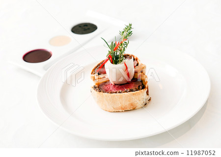 Fillet Wellington with fresh herbs 11987052
