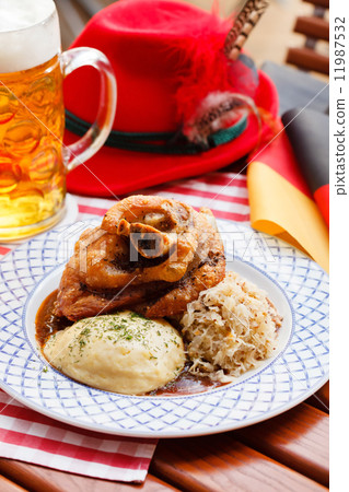 eisbein with braised cabbage, potato and beer 11987532