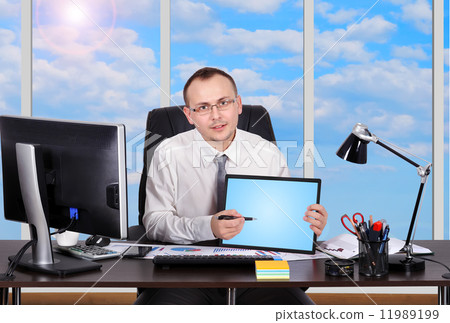 businessman with touch pad 11989199