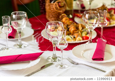 Laid table with food 11990913