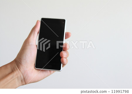 Hand with a smartphone Hand with a smartphone 11991798