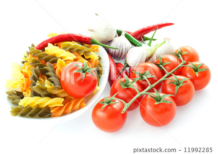 multicolored pasta, pepper, tomato bunch and garlic 11992285