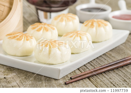 Salapao - Thai steamed buns filled with chicken. Salapao - Thai steamed buns filled with chicken. 11997739