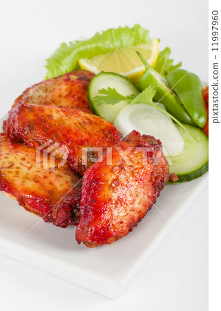 Hot Wings - Spicy and hot chicken wings served with salad. 11997960