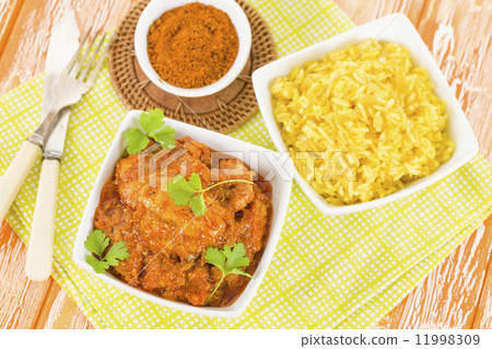 Quwarmah Al Dajaj - Kuwaiti curried chicken with saffron rice. Traditional Arab food. Quwarmah Al Dajaj - Kuwaiti curried chicken with saffron rice. Traditional Arab food. 11998309
