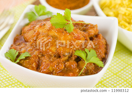 Quwarmah Al Dajaj - Kuwaiti curried chicken with saffron rice. Traditional Arab food. 11998312