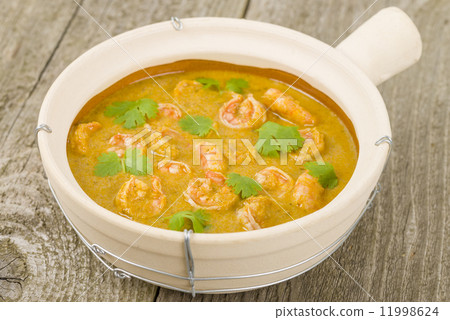 Moqueca de Camarao - Brazilian prawns in coconut milk and dende oil. Food from Bahia. 11998624