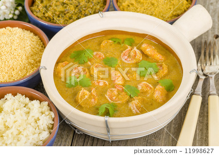 Moqueca de Camarao - Brazilian prawns in coconut milk and dende oil. Food from Bahia. 11998627