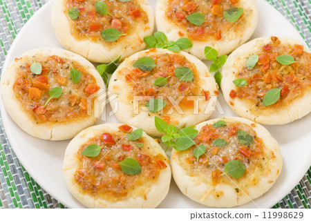 Mini Margherita Pizzas - Small pizzas with tomato sauce, cheese and basil topping. Party food! 11998629