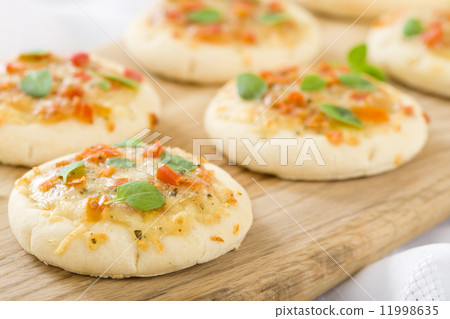 Mini Margherita Pizzas - Small pizzas with tomato sauce, cheese and basil topping. Party food! 11998635