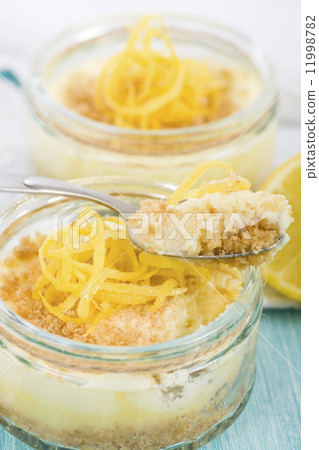Lemon Cheesecake - Individual lemon cheesecakes with a biscuit base. 11998782