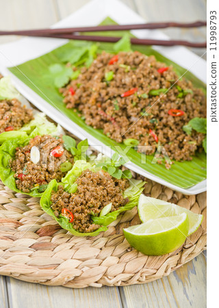 Larb - Lao minced beef salad with fish sauce, lime juice and fresh herbs. 11998793
