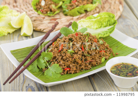 Larb - Lao minced beef salad with fish sauce, lime juice and fresh herbs. Larb - Lao minced beef salad with fish sauce, lime juice and fresh herbs. 11998795