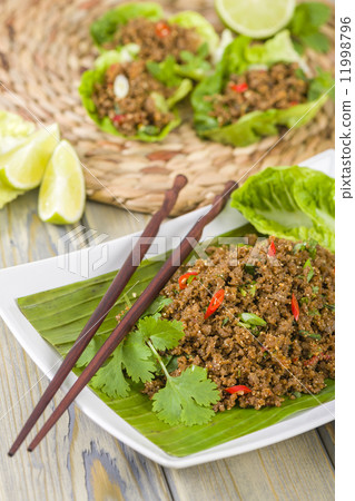 Larb - Lao minced beef salad with fish sauce, lime juice and fresh herbs. Larb - Lao minced beef salad with fish sauce, lime juice and fresh herbs. 11998796
