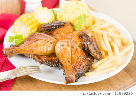 Piri Piri Chicken - Spatchcocked poussin grilled with piri piri sauce. Piri Piri Chicken - Spatchcocked poussin grilled with piri piri sauce. 11999229