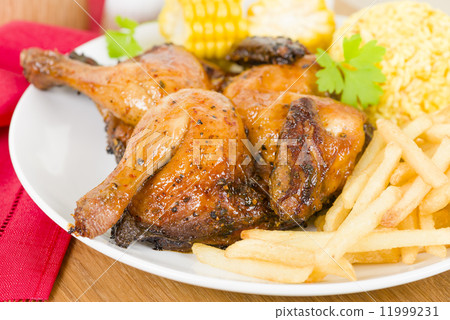 Piri Piri Chicken - Spatchcocked poussin grilled with piri piri sauce. Piri Piri Chicken - Spatchcocked poussin grilled with piri piri sauce. 11999231