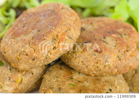 Shami Kebab - Minced meat and chana dal patties stuffed with red onion pickle. Shami Kebab - Minced meat and chana dal patties stuffed with red onion pickle. 11999309