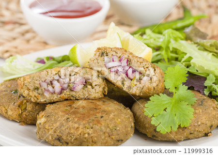 Shami Kebab - Minced meat and chana dal patties stuffed with red onion pickle. 11999316