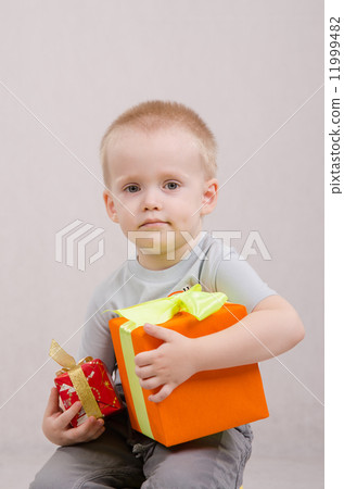 Year-old boy with gifts Year-old boy with gifts 11999482