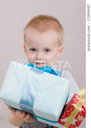 Boy with big gift Boy with big gift 11999487