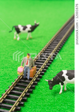 A traveler walking on the track 12001676