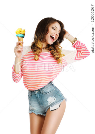 Pleasure. Cute Young Woman with Ice Cream Enjoying Life 12005267