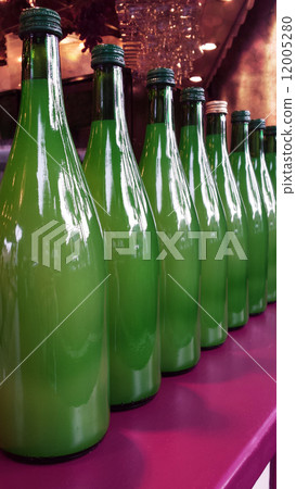 Harvest Festival. Row of New Wine in Green Bottles for Sale Harvest Festival. Row of New Wine in Green Bottles for Sale 12005280