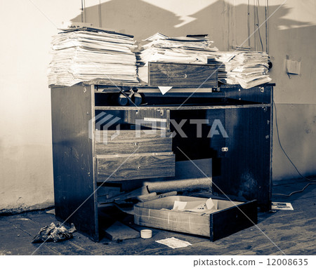 Messy workplace 12008635