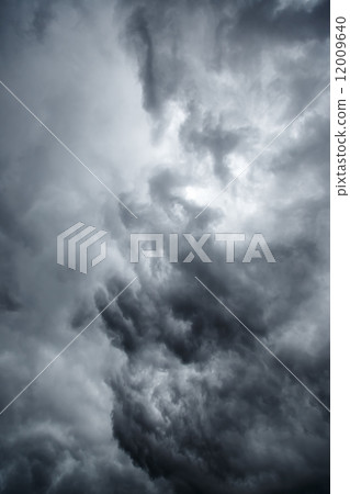 Stormy grey cloudy sky Stormy grey cloudy sky 12009640