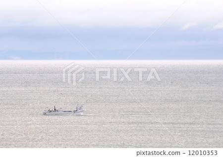 Squid fishing boat fishing boat going Uchinoura bay in the morning 12010353