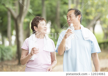Senior couple doing running 12014061