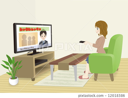 A woman watching TV A woman watching TV 12018386