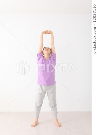 Middle aged women exercising 12027110