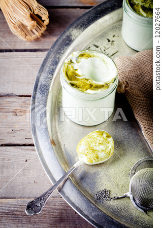 Green tea matcha yogurt, dessert in glass jars Green tea matcha yogurt, dessert in glass jars 12027664