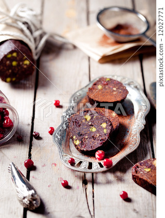 Chocolate dessert salami with cranberries Chocolate dessert salami with cranberries 12027771