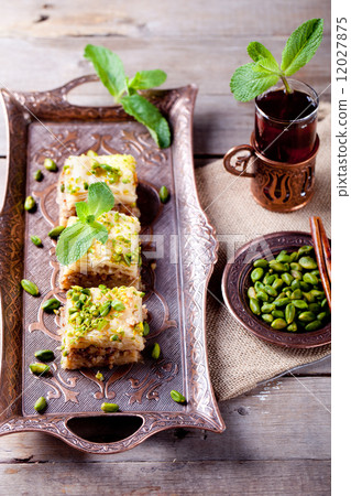 Turkish nut and phyllo pastry dessert, baklava Turkish nut and phyllo pastry dessert, baklava 12027875