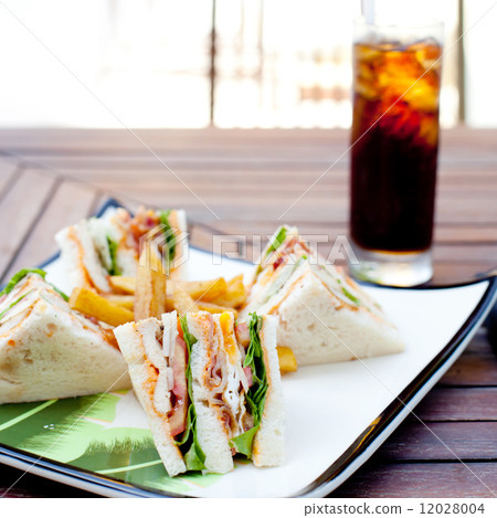 Club sandwich with iced soda drink Club sandwich with iced soda drink 12028004