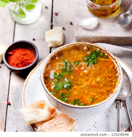 Lentil soup with smoked paprika and bread 12028046