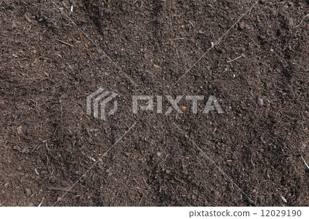 Soil surface background, manure compost prepared for a farmland 12029190