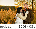 Couple in love hugging in autumn sunset 12034081