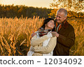Couple in love embracing in autumn sunset 12034092